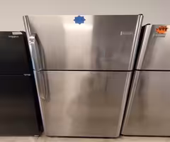 Frigidaire 30in Top Freezer Refrigerator With Icemaker used in good condition wi